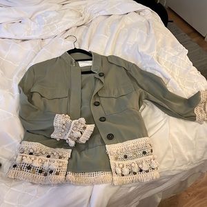 Army green denim jacket with beige fringe
